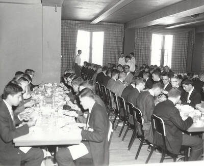 Attendees of the 37th National Convention of the Intercollegiate Knights, a national honorary service organization, gather for a closing day banquet in the Student Union Building ballroom.