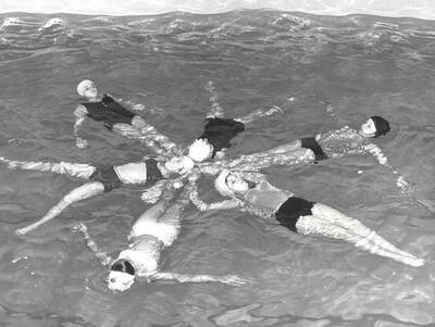 Diana Kinzer, Kay Barnes, Swen Hyke, Nancy Knox, Marcia Gellert, and Maureen Snow perform in the Helldivers swimming club program 'Moods of Music.' Individuals are identified clockwise from top