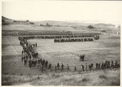Practicing the Idaho Stunt on MacLean Field for the Harvard Yell Contest.