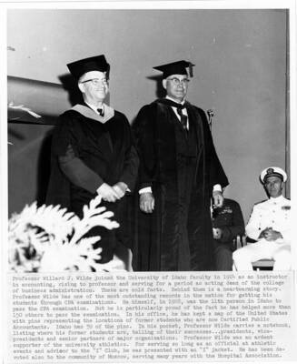 Professor Willard J. Wilde (left) upon his retirement during the 1964 Commencement ceremony. Photographer Publications Department