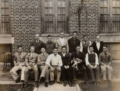 Members of Alpha Tau Omega fraternity pose for a group photograph outside of Alpha Tau Omega.
