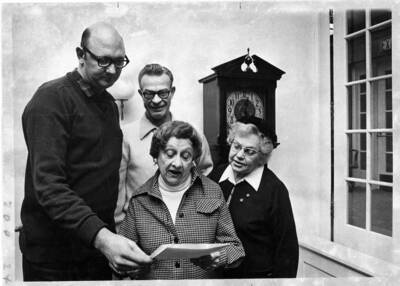 Dr. Terry Armstrong, Dick Snyder, Mrs. Vaughan McDonald and Anna Neely plan class reunion activities.