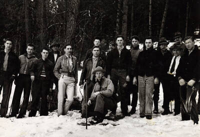 Cruising a section of State Timber on a 2-day field trip before summer camp. Art Nelson on snowshoes; also, Ken Kehrer, Ken Hungerford, Jonathan Wright, Jess Campbell, Woody Snyder, Fred Clubb, Woody Doupe, Howard Johnson, Bob Kirkpatrick, Frank Meneely, Howard Ahlskog, Professor Willeson.