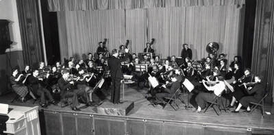 The University Orchestra performs under the direction of Professor Carl Claus.