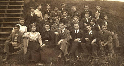 The graduating class of 1901 poses together near the stairs to the original Administration Building. Individuals identified on mount.