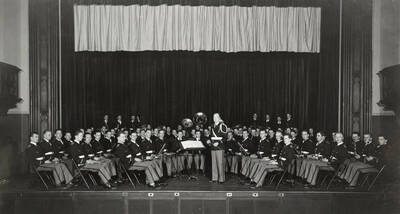 The University of Idaho Military Band poses for a photograph in the Administration Auditorium.