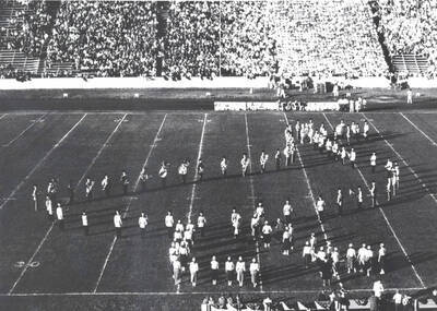 The Vandal Marching Band performs during halftime at a football game.