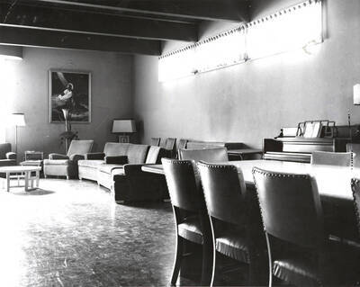The interior of the Idaho Institute of Christian Education is decorated with brass-studded leather chairs and upholstered couches.