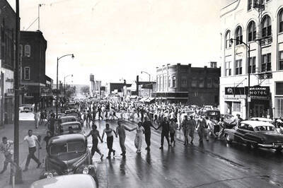 Students snake through downtown in their pajamas as part of the Serpentine, a Homecoming tradition at the University of Idaho.
