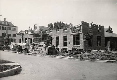 Alpha Tau Omega house under construction on the northwest corner of Deakin and Idaho Streets.