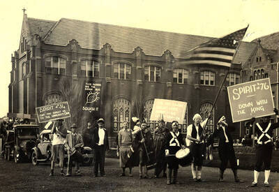 Juniors of the University of Idaho participate in the Junior Week Parade, with each major of study representing a different time period of American history.
