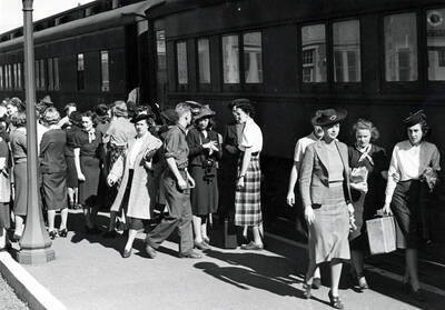 New and returning students arrive in Moscow and wait outside the Student Special train.