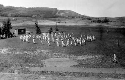 Group of dancers dressed in Native American garments, performing 'Spirits of the Waters' and 'Spirits of the Waste Places' for the Light on the Mountains pageant.