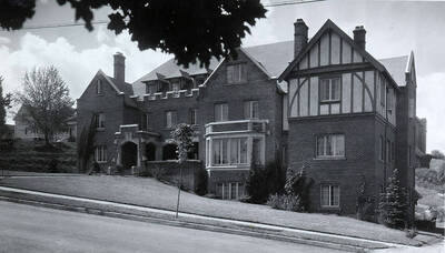 Beta Theta Pi house on the northwest corner of Idaho and Elm Streets.