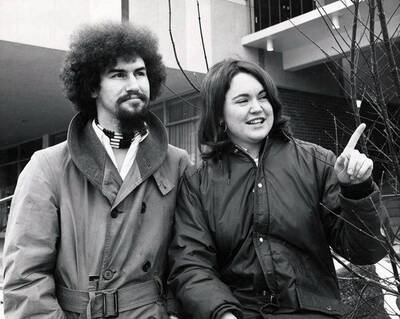 ASUI president Mary Ruth Mann and vice president Tom Slayton talk outside of the Student Union Building.