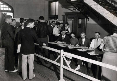 Students stand in line, waiting to vote in ASUI elections.