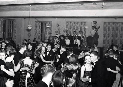 Students laugh while dancing to a live jazz band during the annual Senior Ball.