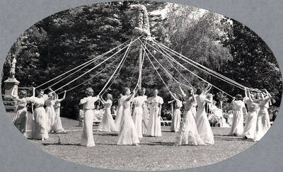 Students wind the maypole during Idaho's Campus Day Maypole Dance celebration.