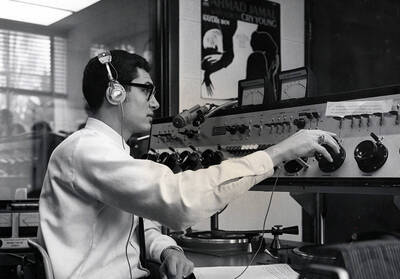 Disc jockey William Jordan sits and works at Idaho's KUOI student-run radio station. The station began broadcasting on air this year.