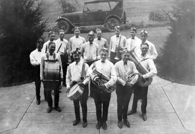 The Idaho pep band poses for a photograph outside the gymnasium.