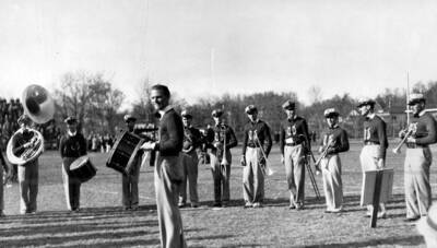 An unidentified drummer smiles in the middle of Idaho's pep band circle prior to a football game.