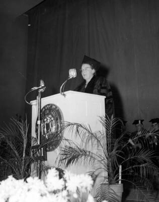Board of Regents President Marguerite Campbell gives a speech at the podium during University of Idaho's commencement.