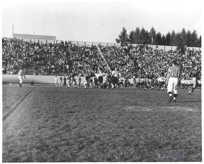 Idaho's quarterback pump-fakes the defense on the 30-yard-line.