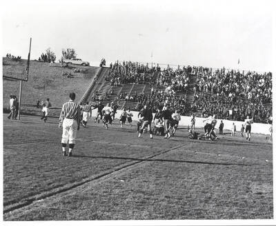 An Idaho receiver reaches high for an attempted touchdown reception.