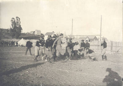 After a play, several players can be seen gathering around the runner, seemingly checking on him.