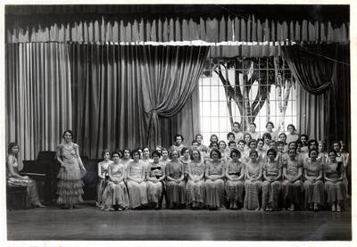 Portrait of the Treble Clef Club. Members include Betty Bandelin, Laura Brigham, Jean Clough, Marjorie Druding, Frances Hanley, Mary Hartley, Jessie Keeney, Ruth Johnson, June McCabe, Margaret McComb, Flora Mulcahy, LaRene Richards, Rosanne Roark, Ida Mae Schofield, Grace Shawen, Margaret Shepherd, Margaret Shonts, Marjorie Talboy, Ruby Wolfe, Verona Wolff, Roberta Bean, Ruth Brody, Janet Gooding, Louise Rosecrans, Eva Jane Brown, Mae Belle Donaldson, Virginia Evans, Marion Fry, Mildred Meredith, Helen Moore, Cecelia Nacke, Vida Nichols-Roy, Irene Parrott, Marjorie Redfield, Edna Scott, Erma Deane Sogard, Helen Stetler, Lorraine Stewart, Elizabeth Thompson, Elizabeth Vincent, Bertha Wilburn, Marjorie Wursterm Eva Weidman, Martha Rehberg, Nona Rudge, Harriet Baken, Alice Bell, Lenore Burnett, Carol Campbell, Betty Gabby, Linn Cowgill, Margrethe Kjosness, Lucile Mott, Grace Nichols, Kathryn Nicholson, Ethlyn O'Neal, Harriet Parish, Martha Shawen, Bernice Smith, Olive Tibbs, Marjorie Vandergrift, frances Wimer, nathelle Hartley, Elinor Lucas.