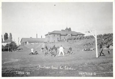 Photograph of the University of Idaho versus Montana football game. Caption reads 'Idaho-40 ~Another Goal For Idaho~ Montana-0.'