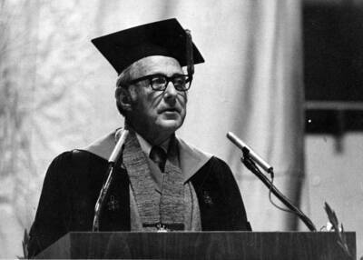 University of Idaho President Ernest W. Hartung addresses graduates and the crowd during Commencement.