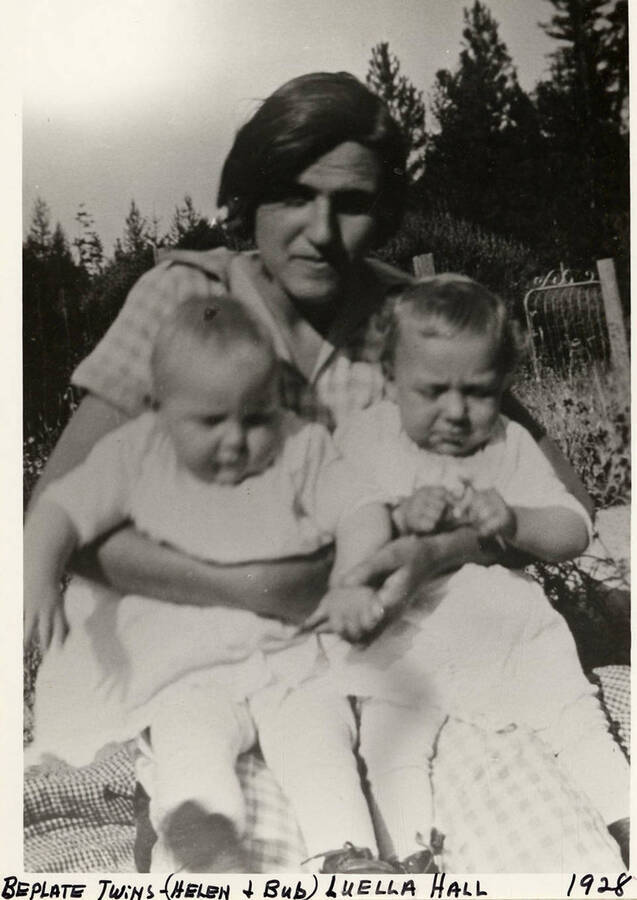 The Beplate twins, Helen and Bub, being held by Luella Hall. Photograph taken in 1928.