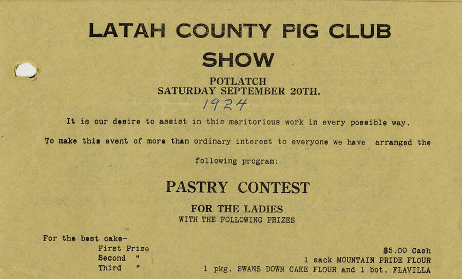 An announcement for the Latah County Pig Club Show including a pastry contest for the ladies with prizes ranging from flour to five dollars.