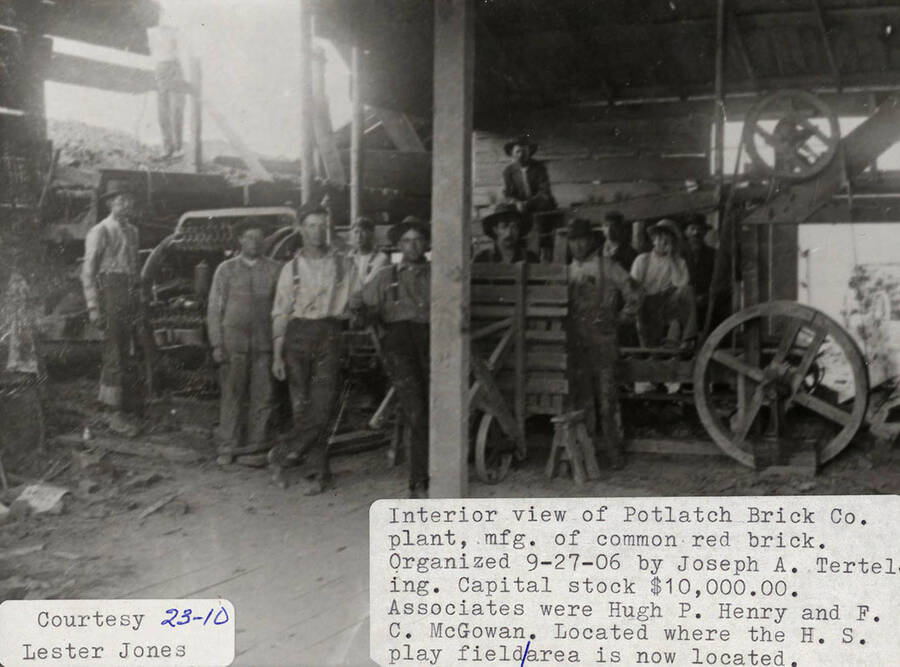 A photograph of the interior of the red brick manufacturer of the Potlatch Brick Company plant. Located where the H.S. play field/area is now, they had a capital stock of $10,000.00. The associates were Hugh P. Henry and F. C. McGowan. It was organized by Joseph A. Tertel.