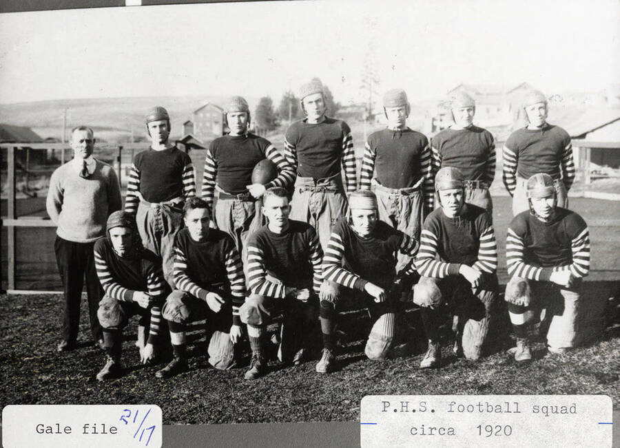 A photograph of the Potlatch High School football squad around 1920.