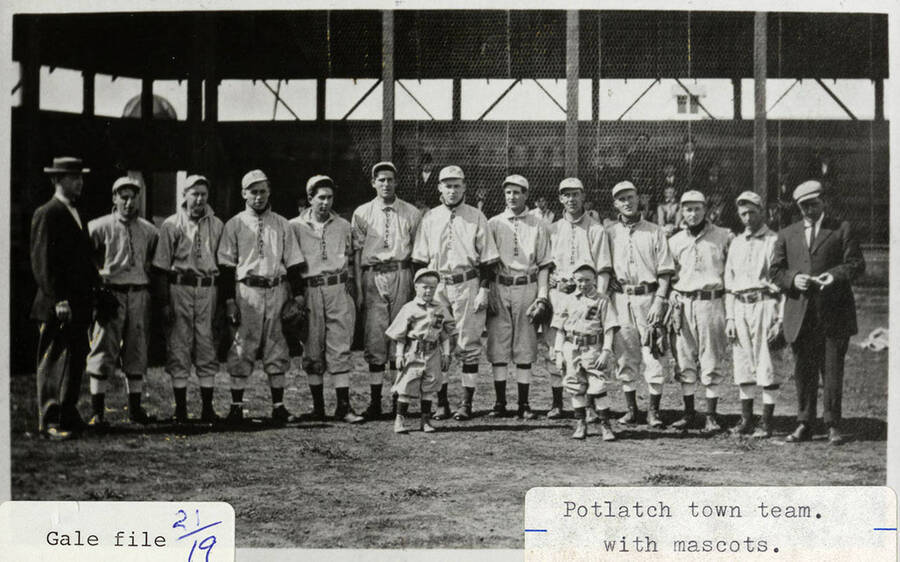A photograph of the Potlatch town baseball team with mascots.