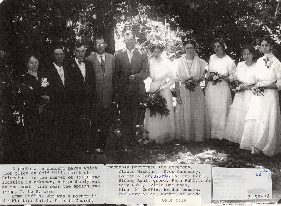 A photograph of a wedding party on the south side of Gold Hill north of Princeton. The group includes Emma Coffin (pastor in Whittier, California Friends Church, probably performed ceremony), Claude Haskins, Econ Guernsey, brother of the bride Forest Allen, groom Sidney Ruhl, bride Fern Ruhl, Mary Ruhl, Viola Guernsey, brides cousin Miss Coffin, and mother of the bride Mary Allen.