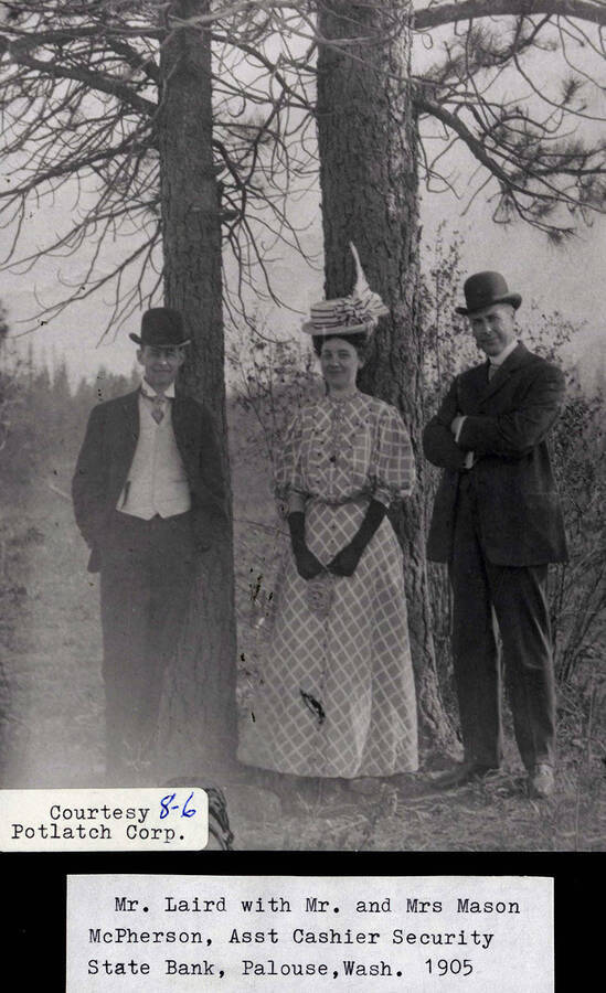 1905 Photograph of Mr. Laird and Mr. and Mrs. McPherson in front of some trees on the Palouse.