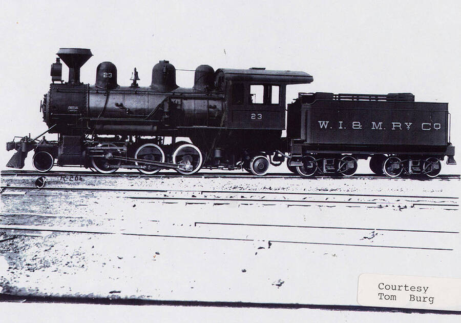 View of a No. 23 locomotive. The locomotive can be seen sitting in the middle of a group of railroad tracks.