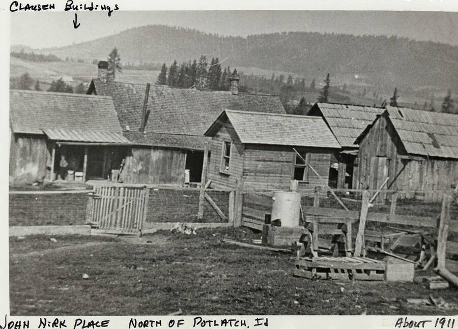 Buildings on the John Nirk Place North of Potlatch, ID.  The Clausen buldings are labeled with by an arrow.  Taken around 1911.