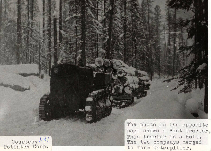 View of the Holt tractor that the two companies merged with a Best tractor form Caterpiller. The tractor can be seen hauling stacks of wood through the snow.