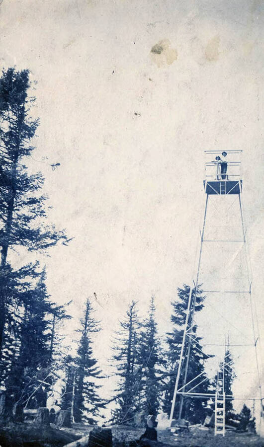 Postcard of Gold Hill Tower lookout with a couple standing at the top.