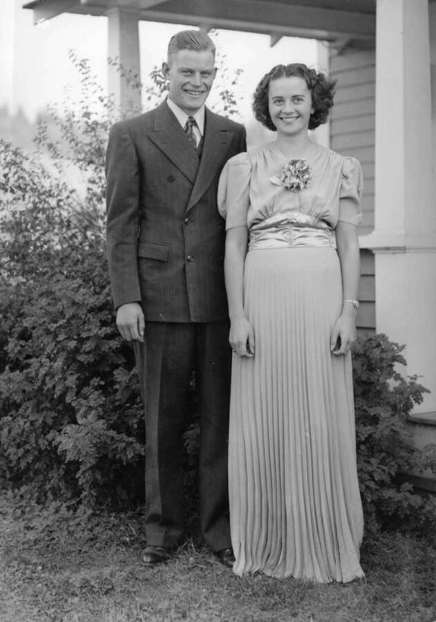 Dwight and Cleora Nirk Strong were married Sept. 29, 1939. This picture taken by Charles Bysegger in front of the folks house.