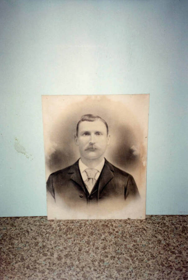 Photograph of a painted portrait of W.W. Davis