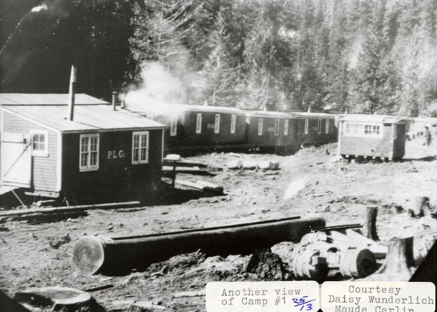 View of Camp one on Hatter Creek, which is located south of Princeton. Many buildings with 'PLC' on the side can be seen around the camp.