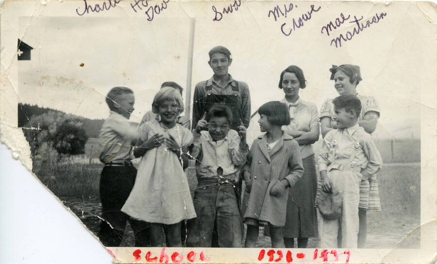 From left to right: Charles and Harold Davis, Elvin Swatman, Mrs. Crowe, Mae Martinson, bottom row Patsy McManama Larson, Bob Davis, Lillian Anderson, and Arnold Anderson.