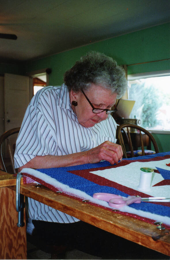 Lillian Thompson focuses on the quilt she is making at the Princeton Community Club.