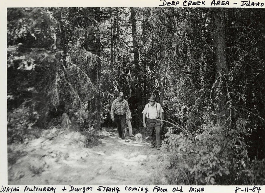 Wayne McMurray and Dwight Strong coming from the old mine on W. McMurray Place (old Alva Strong Place) in Deep Creek area Idaho.