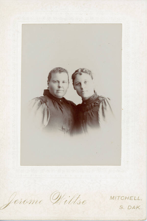 A formal portrait of Bertha Gibss Parnell and Mabel Gibbs.